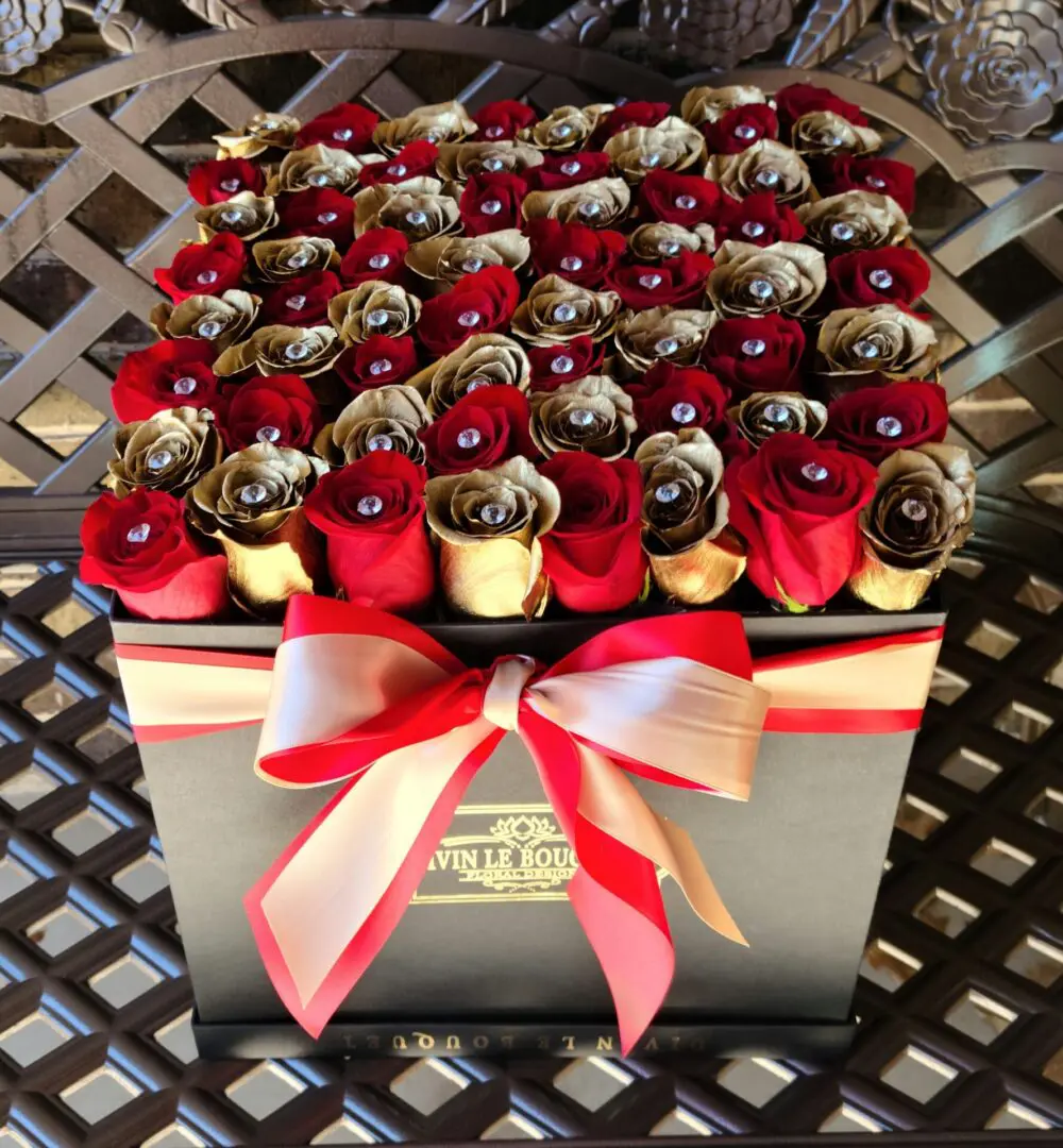 Medium Square Box of red and gold roses