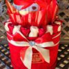A red and white gift box with candy