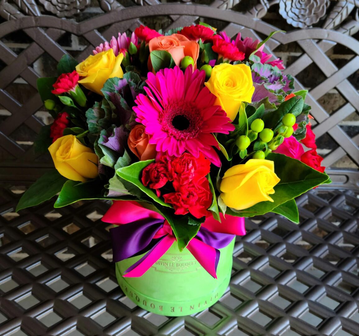 A bouquet of flowers sitting on top of a table.