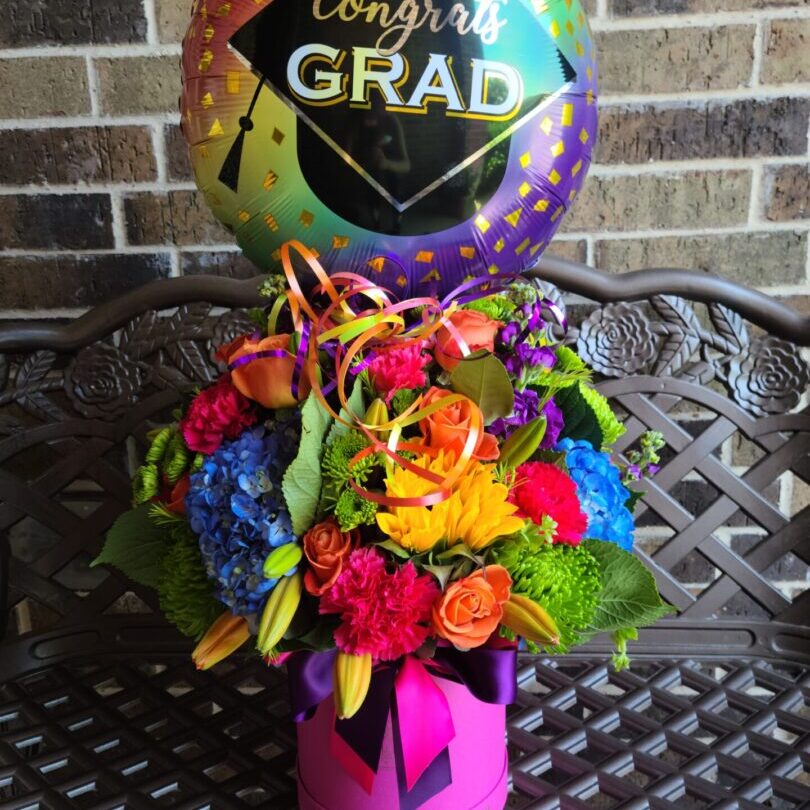 A bouquet of flowers sitting on top of a table.